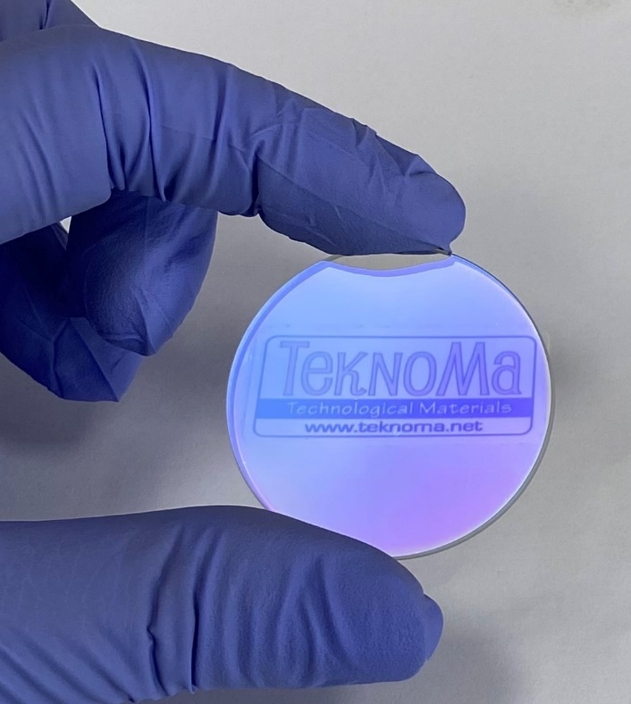 Thanks to the high visible region transmittance, the TEKNOMA logo in the background is observed clearly.